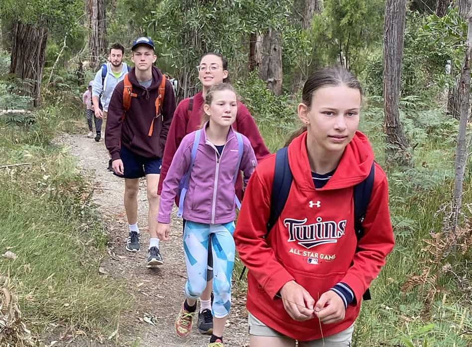 Children walking through nature