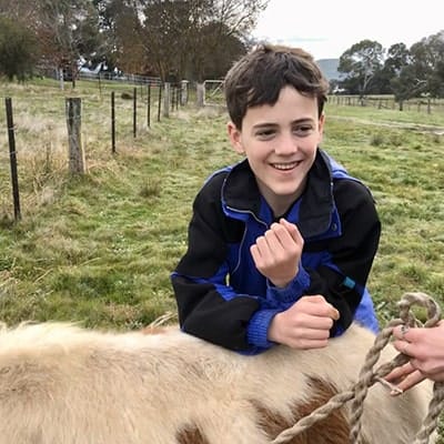 Smile resting on pony