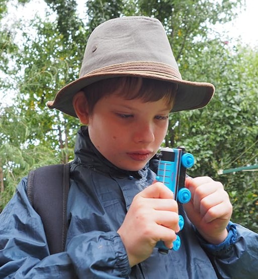 Child and Thomas toy